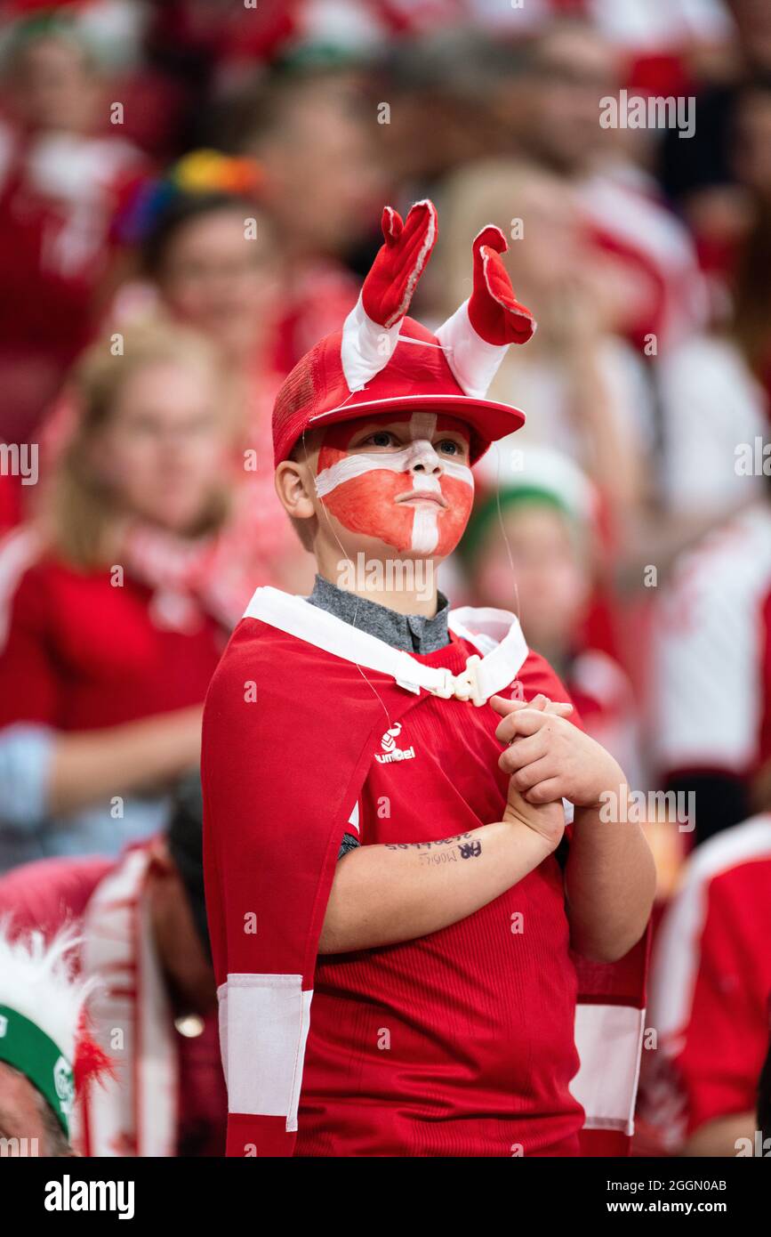 Copenhagen, Denmark. 01st Sep, 2021. Football fans of Denmark dressed in red and white and fan gear seen on the stands during the UEFA World Cup qualifier between Denmark and Scotland at Parken in Copenhagen. (Photo Credit: Gonzales Photo/Alamy Live News Stock Photo