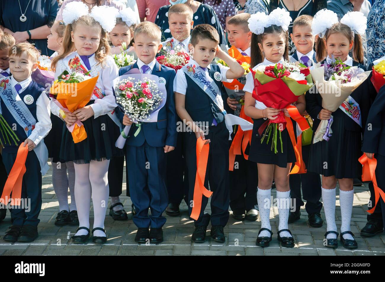 Kotovk, Russia. 01st Sep, 2021. First-graders at the Ecotech school in the city of Kotovsk. This year, according to the Ministry of Education and Science, 1,600,000 first-graders will sit at school desks in Russia. On the Day of Knowledge on September 1, a traditional school line was held at the Ecotech School in the city of Kotovsk (Tambov Region, Russia). (Photo by Lev Vlasov/SOPA Images/Sipa USA) Credit: Sipa USA/Alamy Live News Stock Photo
