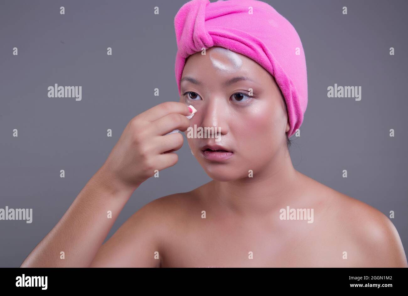 beautiful and young chinese woman skincare on isolated background, beauty concept Stock Photo