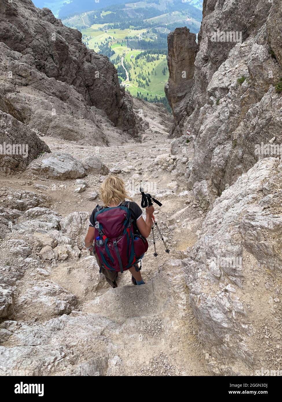 Hiker descending from the mountain Stock Photo - Alamy