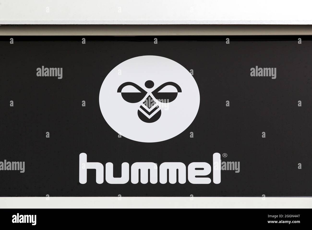 Vejle, Denmark - October 12, 2018: Hummel logo on a wall. Hummel International is a sportswear company based in Denmark Stock Photo