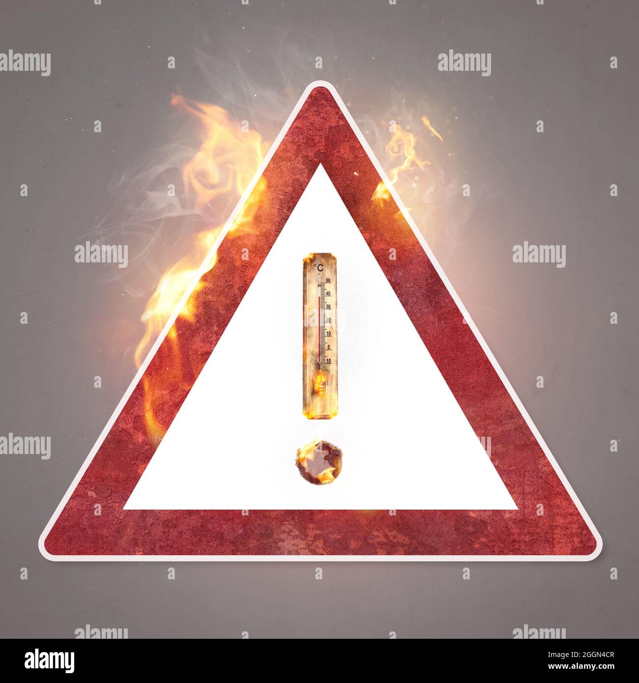 Warning sign with a burning thermometer - global warming concept Stock Photo