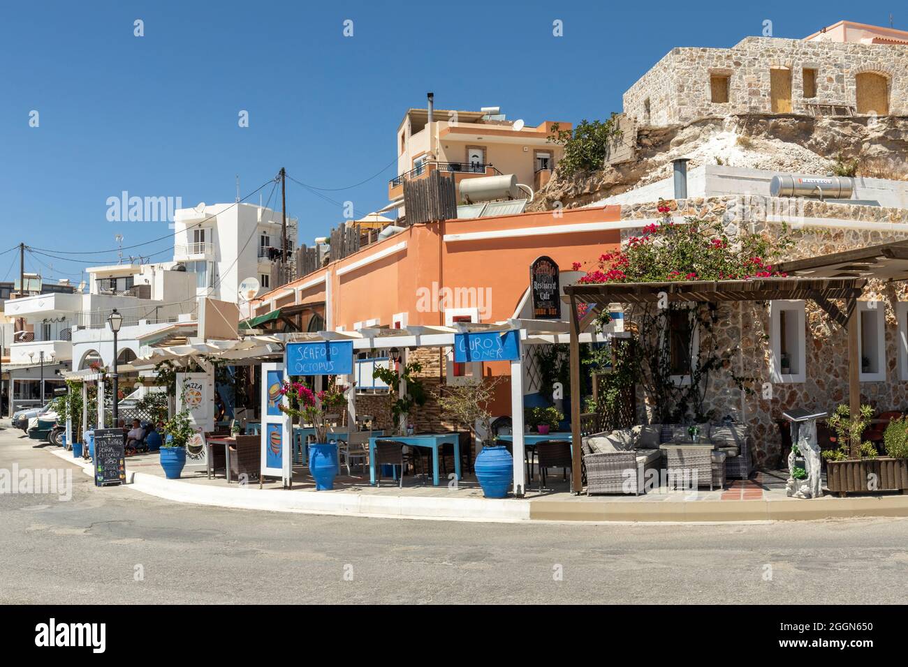 The bars and restaurants in Kefalos village without tourists due to Covid travel restrictions, Island of Kos, Greece Stock Photo