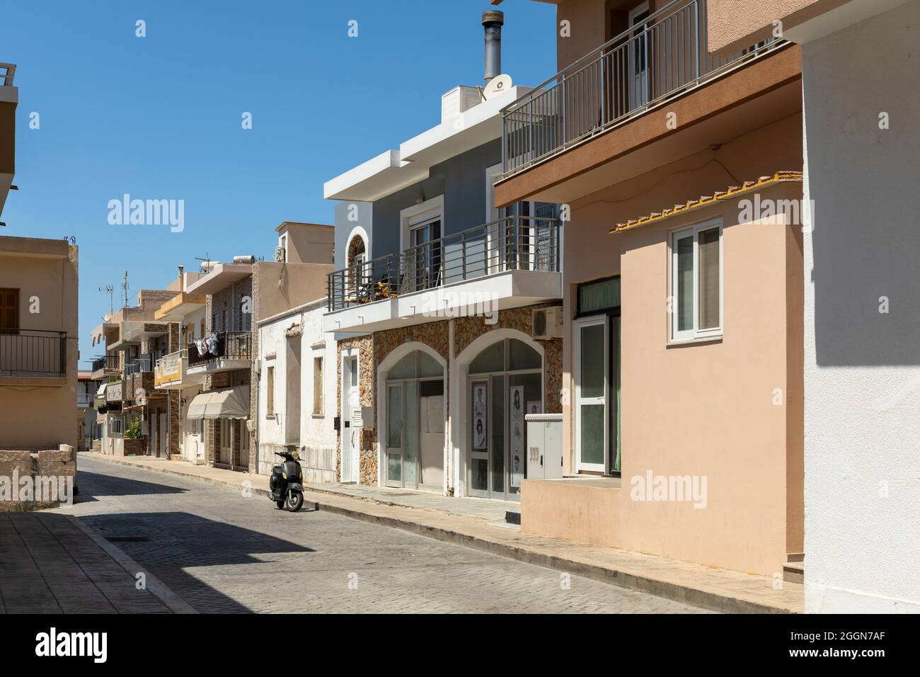 Empty street in Kefalos village, Kos, Dodecanese Islands, Greece Stock Photo