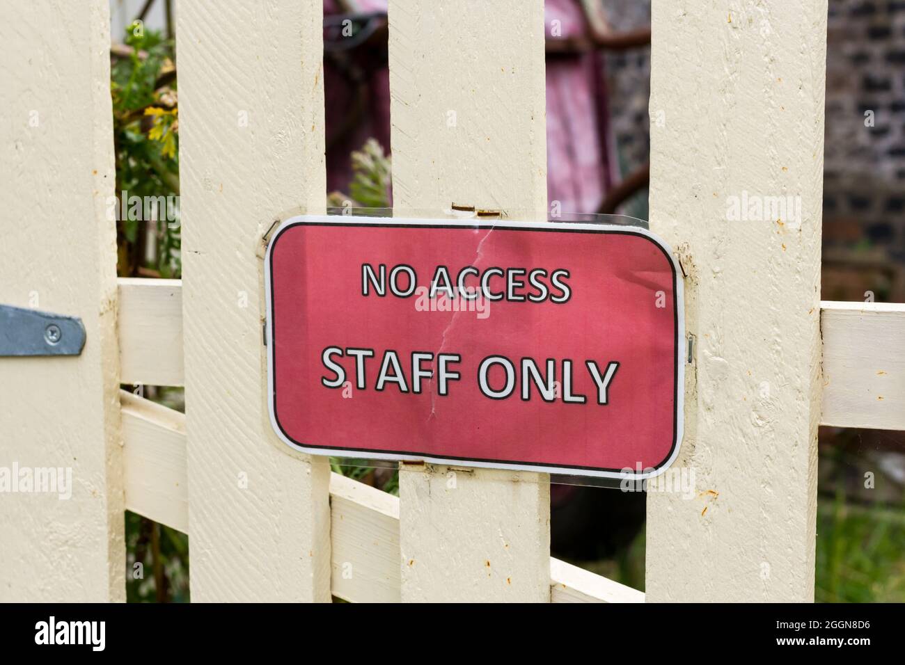 'No Access' 'Staff Only' sign on a gate closeup Stock Photo