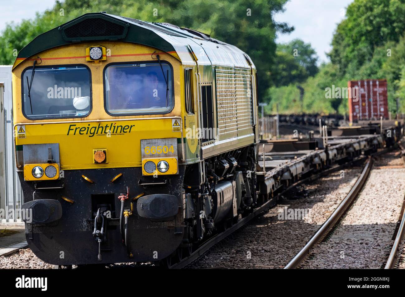 Freightliner freight train on the Ipswich to Felixstowe container port line, Westerfield, Suffolk, UK. Stock Photo