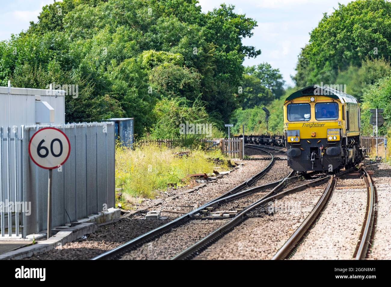 Freightliner freight train on the Ipswich to Felixstowe container port line, Westerfield, Suffolk, UK. Stock Photo