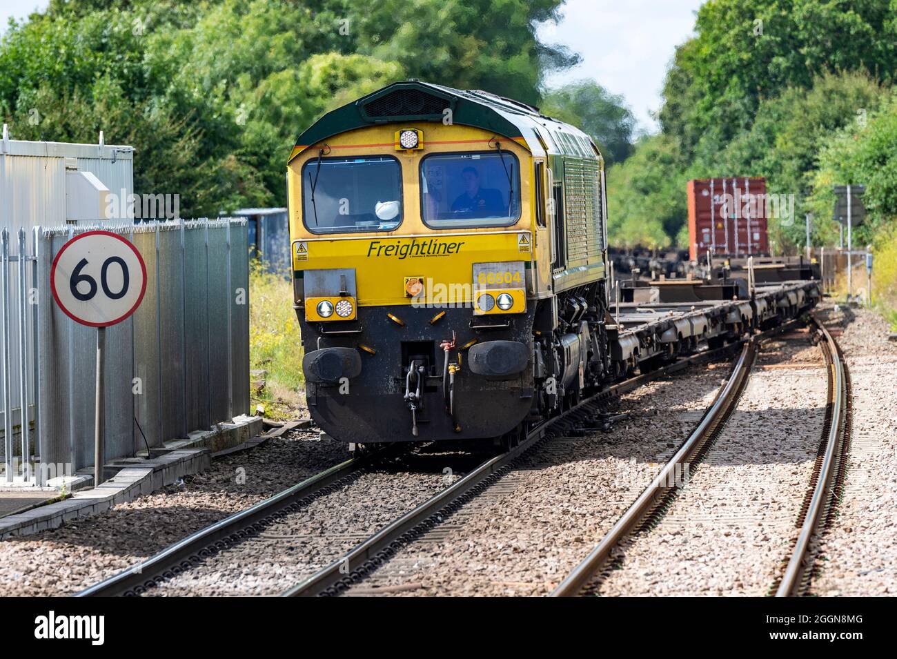 Freightliner freight train on the Ipswich to Felixstowe container port line, Westerfield, Suffolk, UK. Stock Photo