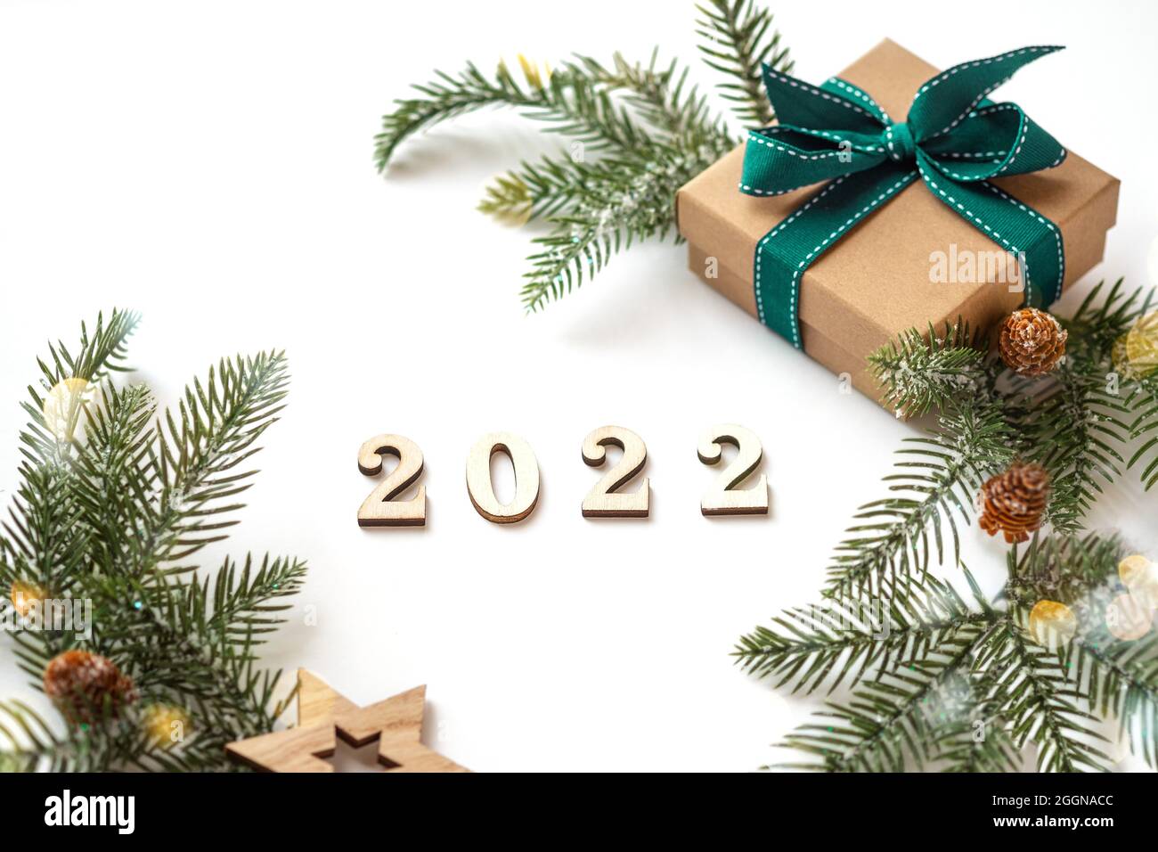 Xmas 2022 Composition With Present Box Decorations, Wooden Snowflakes, Fir Tree Branches. Merry Christmas White Background ,New Year Concept For Design Template Or Mockup With Copy Space Stock Photo - Alamy