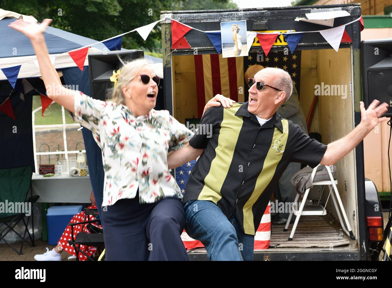 Couple in retro attire dancing during a 50s Weekend at the Watercress Line, Alresford, Hampshire, UK. Stock Photo