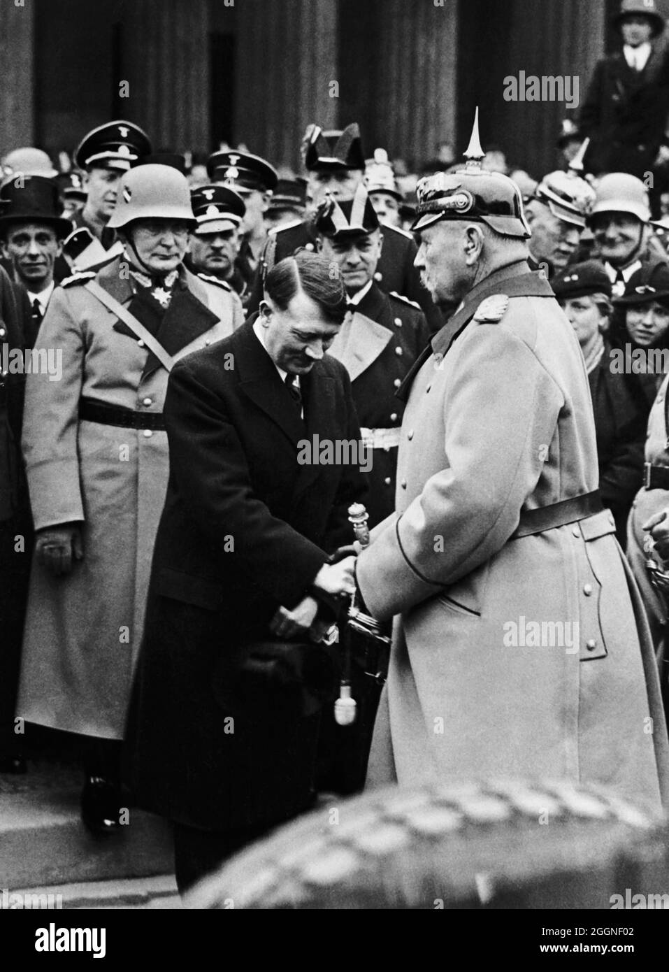 Reich Chancellor Adolf Hitler greets President Paul von Hindenburg. Museum: PRIVATE COLLECTION. Author: ANONYMOUS. Stock Photo