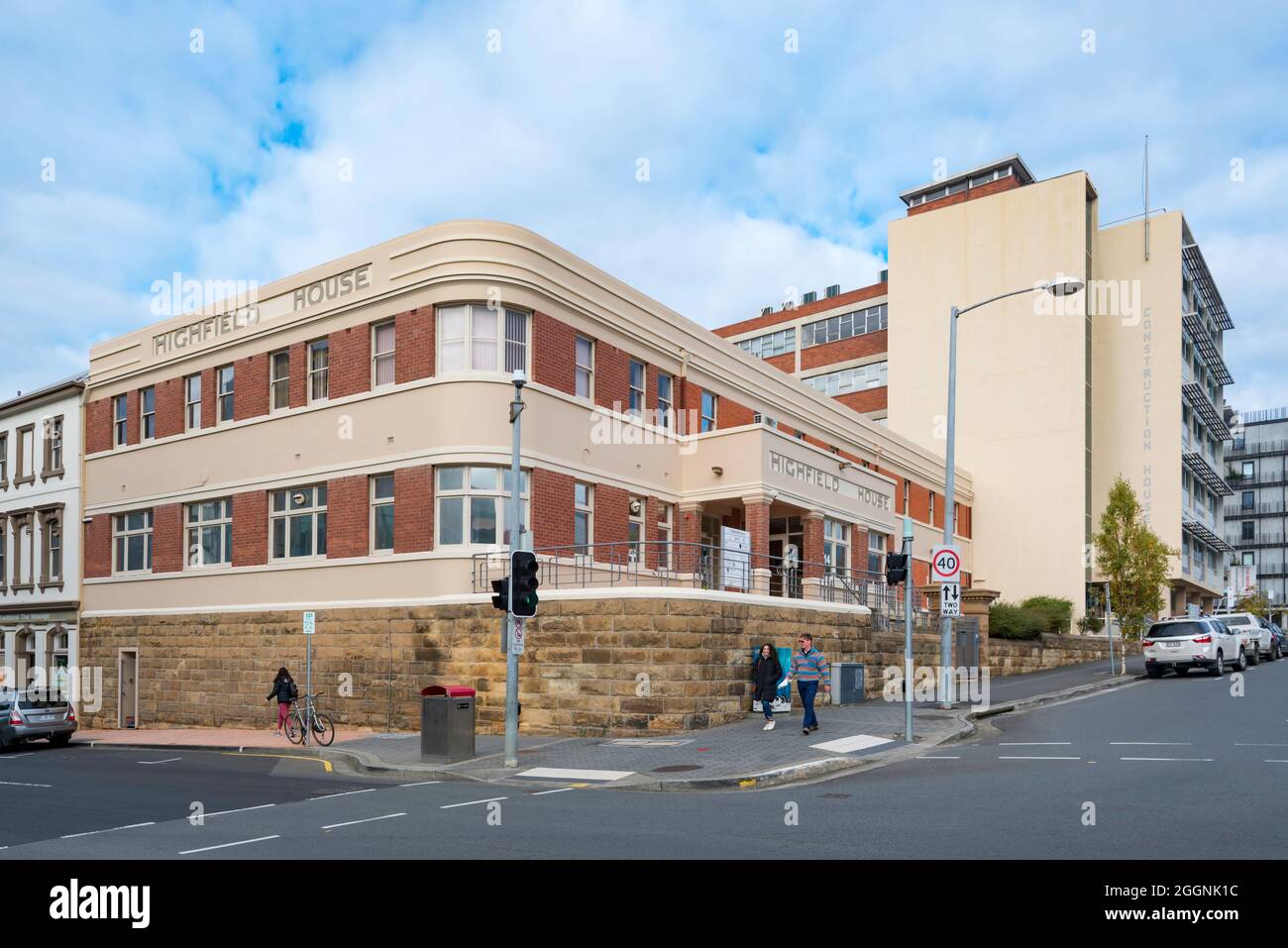 High-Field House in Hobart, Tasmania, Australia  is an Art Deco style building with horizontal render banding surrounding the corner building Stock Photo