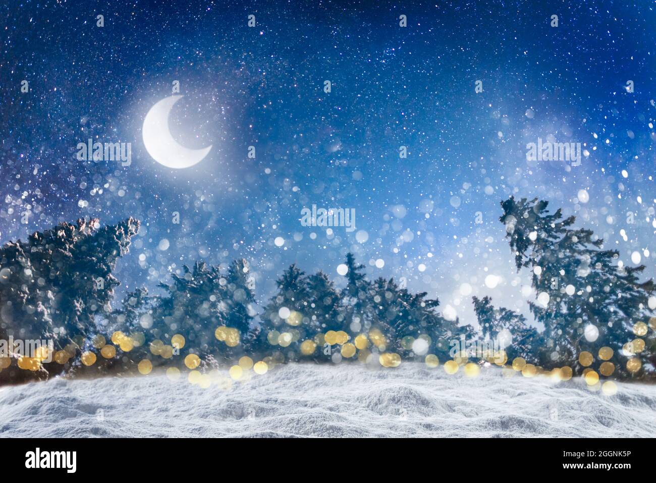 Old winter background for Merry Christmas and Happy New Year with fluffy snowdrifts against background of night winter forest, falling snow and dark s Stock Photo