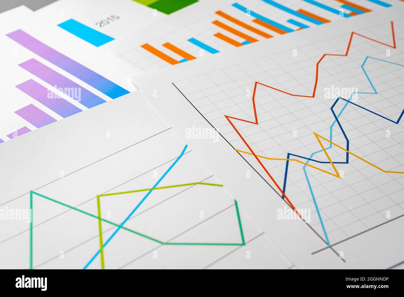 Business graph analysis documents on gray background Stock Photo - Alamy