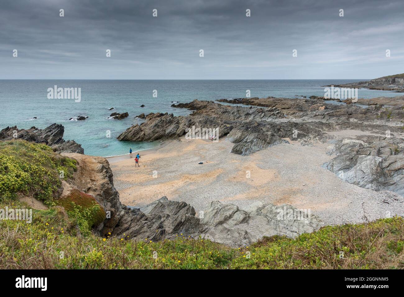 Low cloud over the secluded Little Fistral in Newquay in Cornwall. Stock Photo