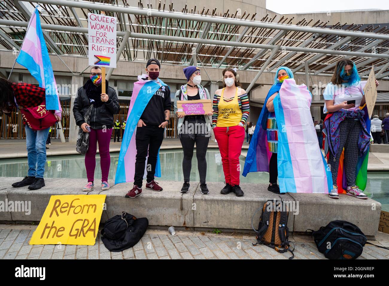 Edinburgh, Scotland, UK. 2nd September 2021.Demonstration supporting women’s rights held outside The Scottish Parliament at Holyrood in Edinburgh today. Protesters believe that the definition of a women is under threat from Scottish Government law that would give trans-women the same rights as women. The slogan Women Won’t Wheesht has been adopted to promote their movement.  A counter demonstration was also held by proponents of trans people’s rights. Insults were exchanged between both groups. Pic; Trans activists stage counter demo.  Iain Masterton/Alamy Live News. Stock Photo