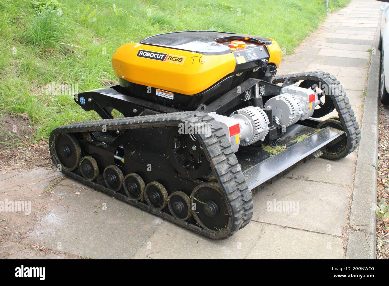 GPS robotic remote control lawn mower. Robocut RC28 all terrain industrial  mower Stock Photo - Alamy