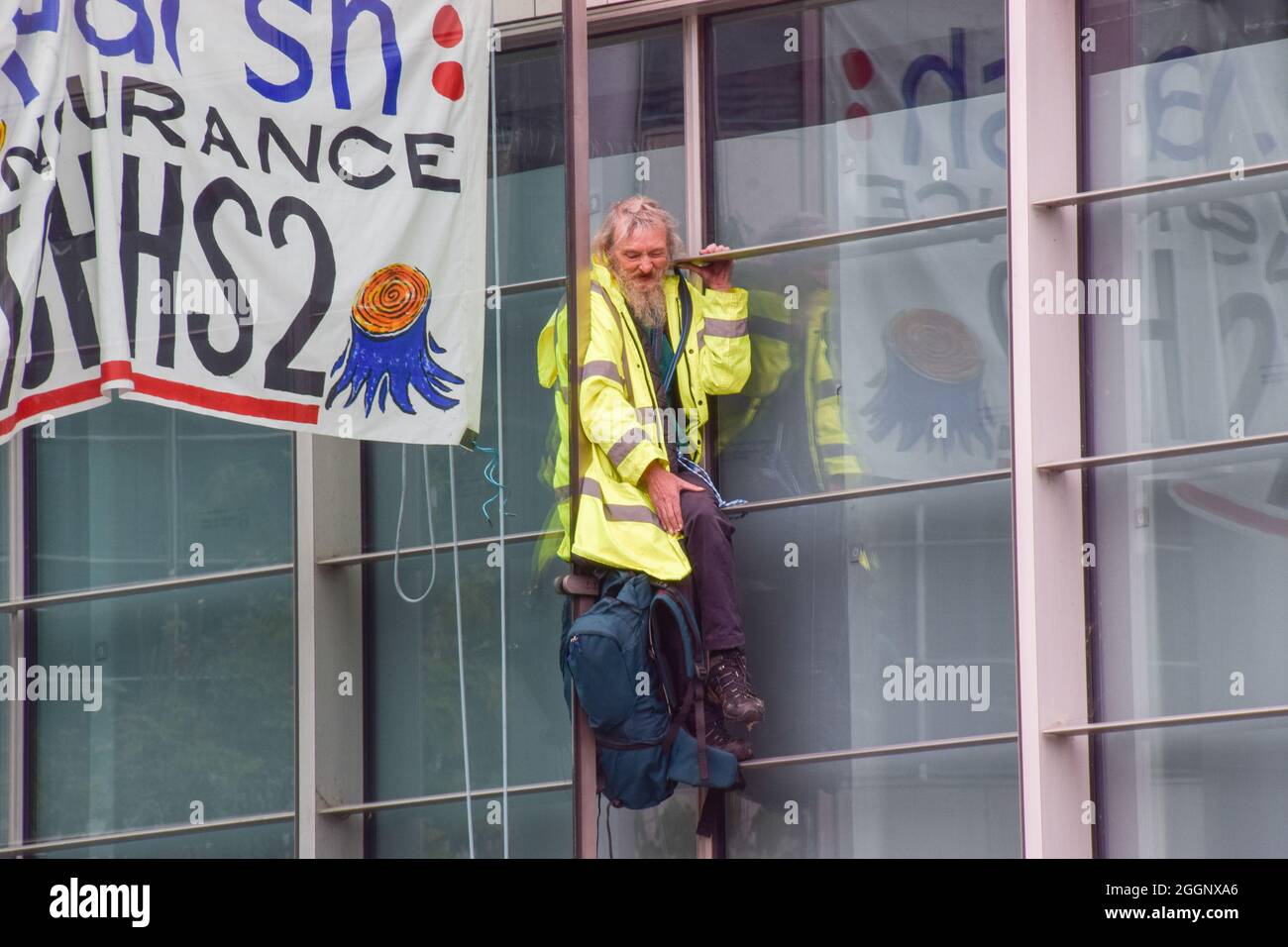 London, United Kingdom. 2nd September 2021. Two HS2 protesters scaled Marsh Insurance offices in the City of London, demanding they stop insuring the HS2 (High Speed 2) railway system. (Credit: Vuk Valcic / Alamy Live News) Stock Photo