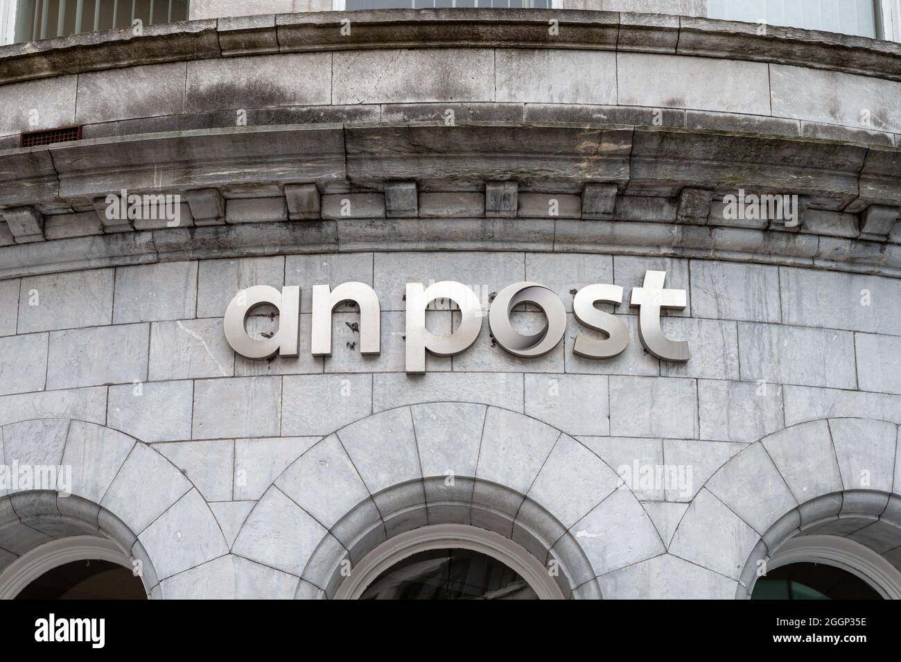 Cork, Ireland- July 14, 2021: The sign for An Post in Cork city Stock Photo