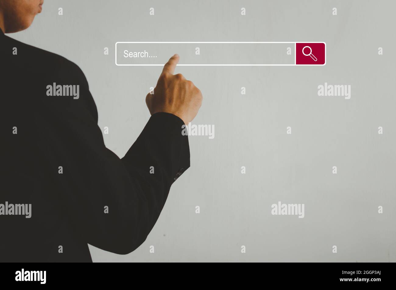 Businessman is touching a search on a virtual screen.Searching information network concept with copy space. internet search page computer touch screen Stock Photo