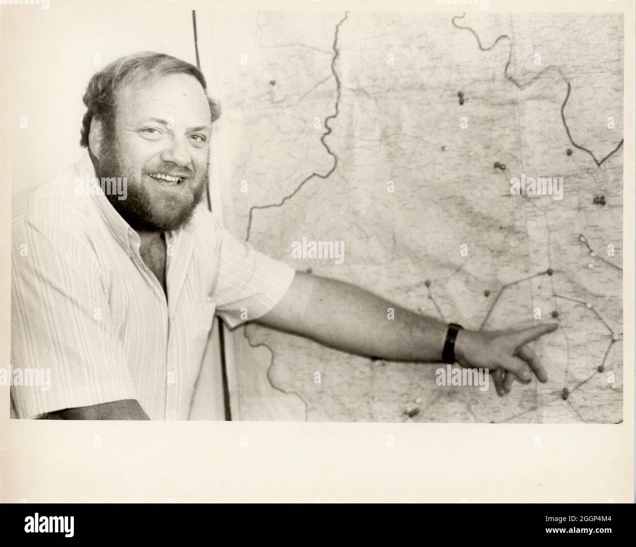 A man pointing at a map. Stock Photo