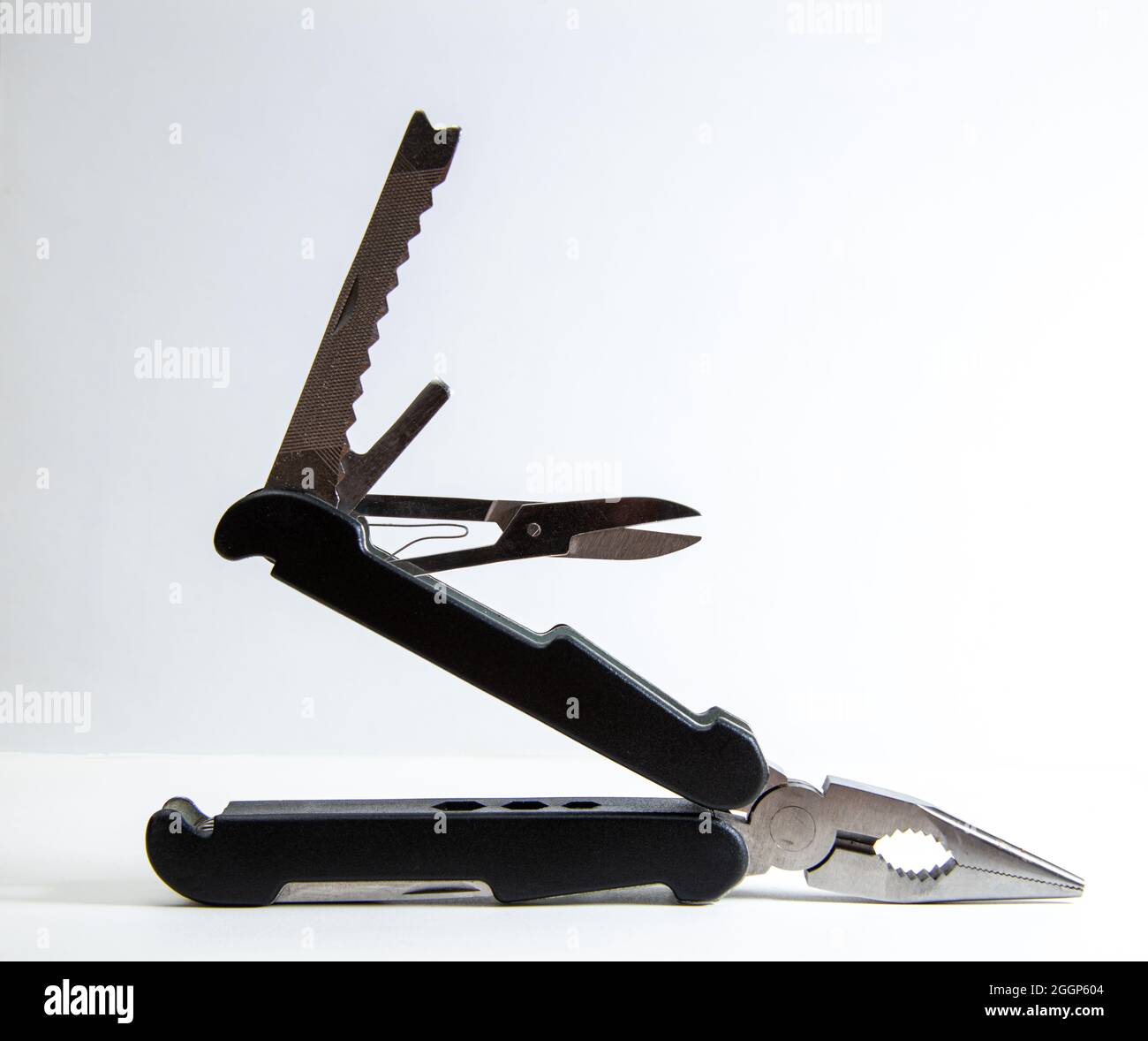 multi purpose tool on white background  ,camping and survival tools for emergency use Stock Photo