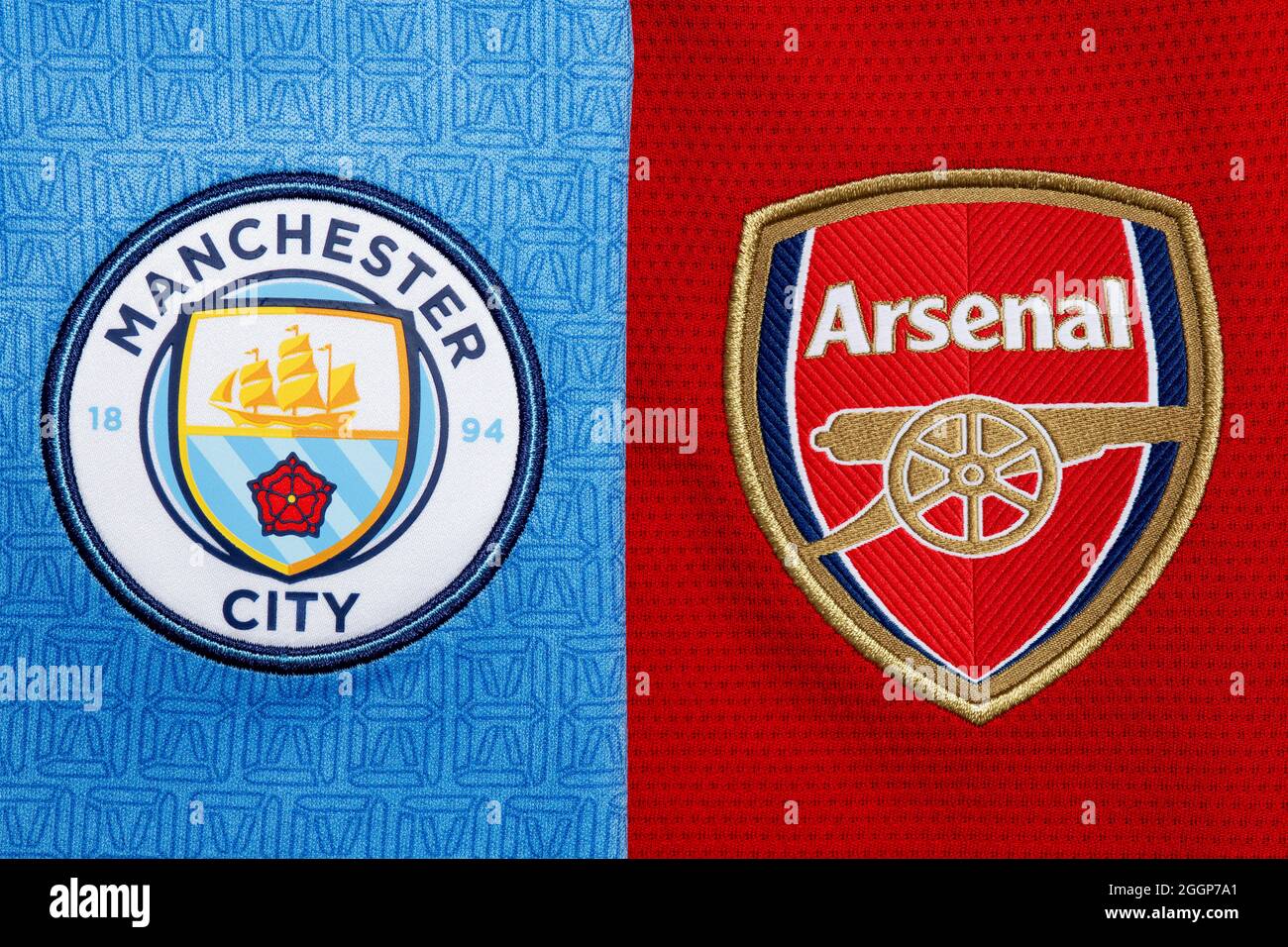 Close up of Manchester City & Arsenal club crest. Stock Photo