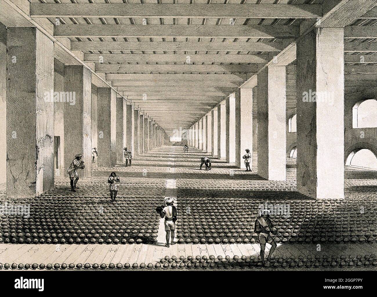 A busy drying room in the opium factory at Patna, India. Stock Photo