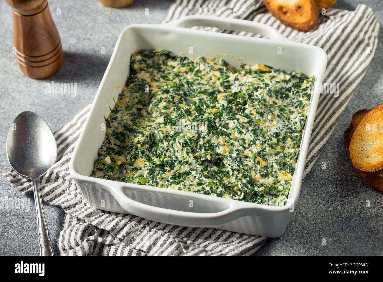 Homemade Creamy Baked Spinach Dip with Toasted Bread Stock Photo - Alamy