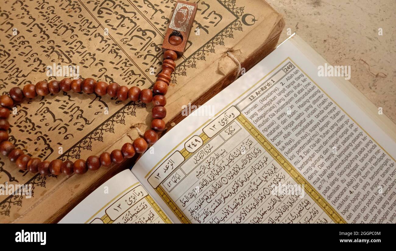 Closeup Shot Of The Quran And Prayer Beads Under The Sunlight Stock Photo Alamy<script async src=