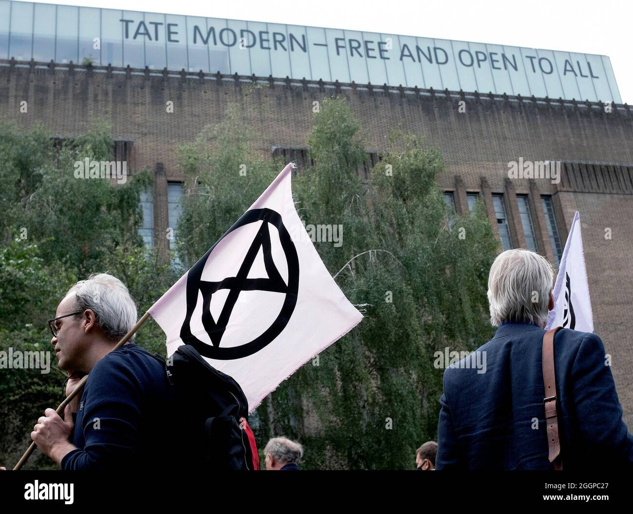 Protestors gather outside of Tate Modern ahead of Extinction Rebellion's Mass Bail Break protest on the eleventh day of their Impossible Rebellion protests in London, United Kingdom on September 2, 2021. Stock Photo