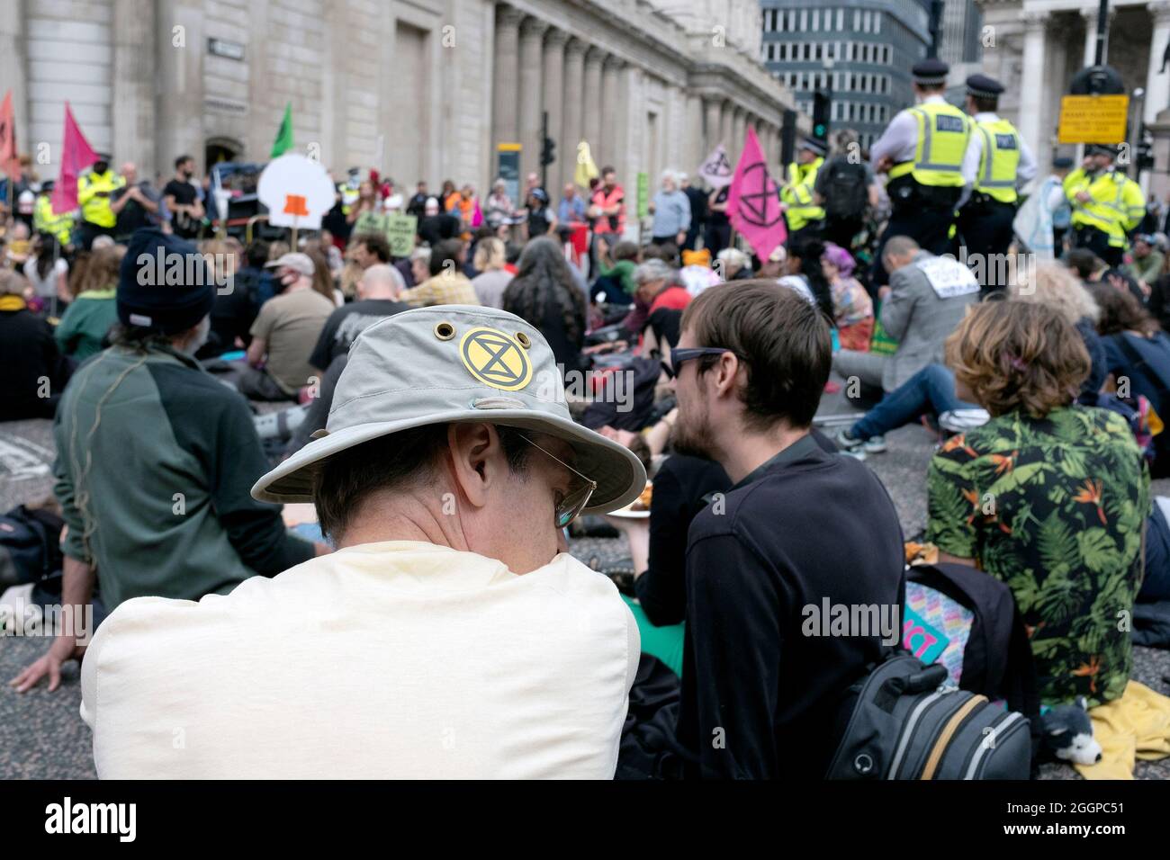 Extinction Rebellion's take space outside of the Bank of England during their Mass Bail Break protest on the eleventh day of their Impossible Rebellion protests in London, United Kingdom on September 2, 2021. Protestors that have been arrested during the Impossible Rebellion have been encouraged to share their stories throughout the day. Stock Photo