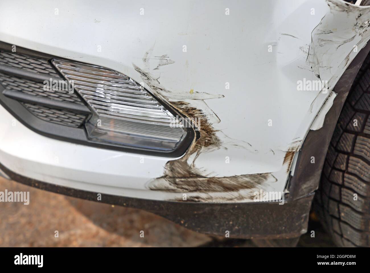 Small Accident Damage at Front Bumper of White Car Stock Photo Alamy