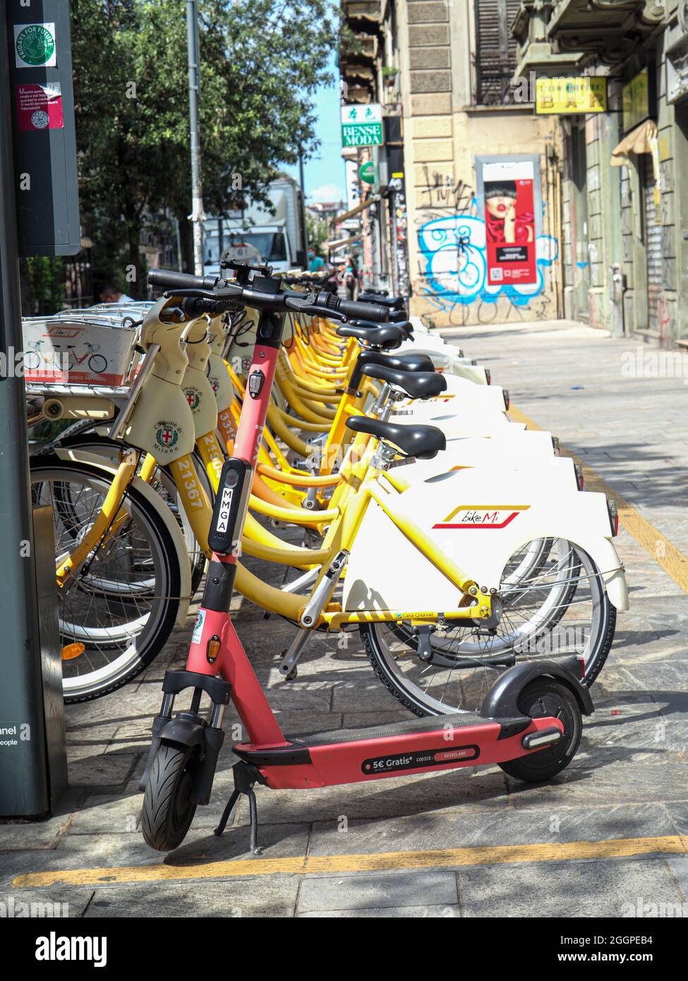 MILANO, ITALY - Aug 08, 2021: A Electric bikes and scooter rental by  smartphone app in Milan Italy Stock Photo - Alamy