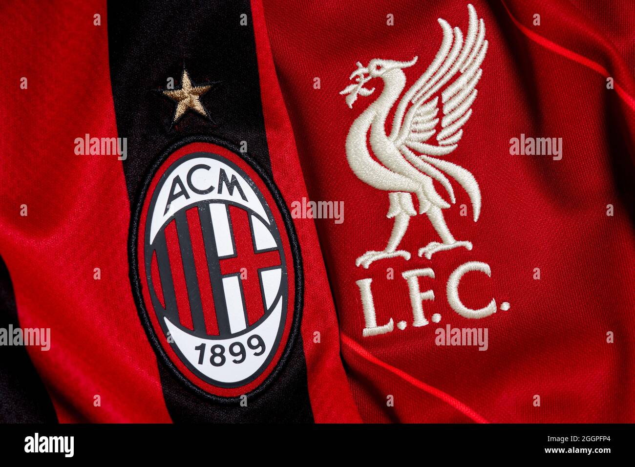 Close up of AC Milan & Liverpool FC club crest. Stock Photo