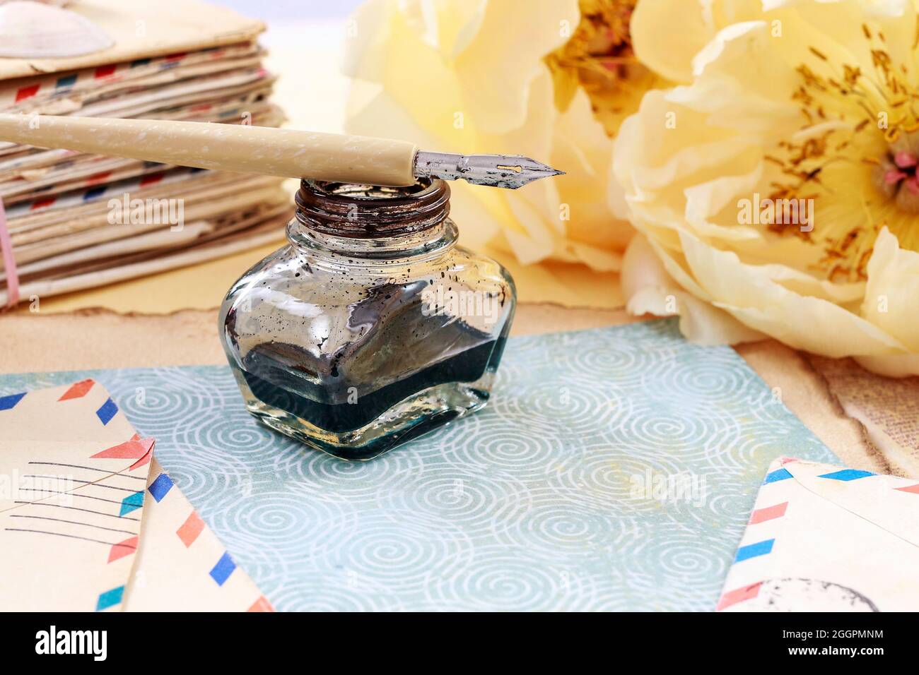 Inkwell, pen and old letters. Retro style Stock Photo - Alamy