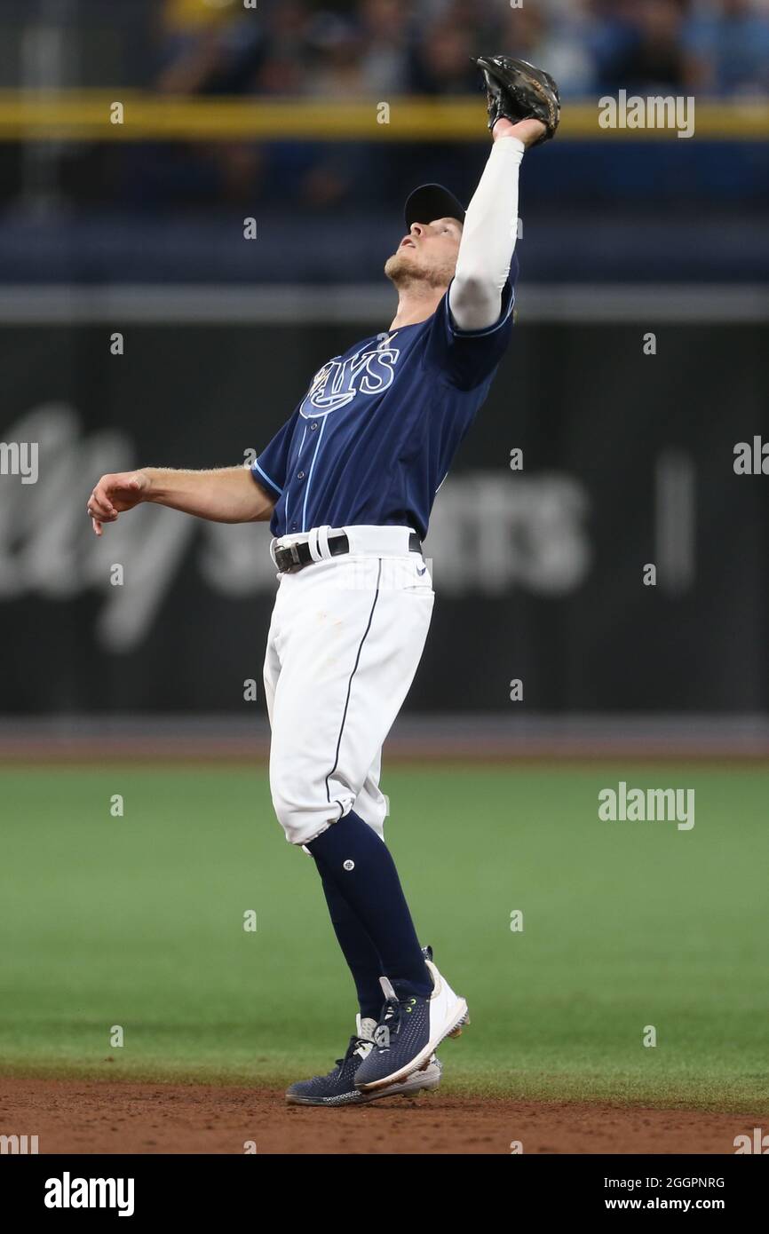 St. Petersburg, United States. 01st Aug, 2021. Boston Red Sox players clap  from the dugout after catcher Christian Vazquez makes a living catch on a  pop fly in foul territory hit by