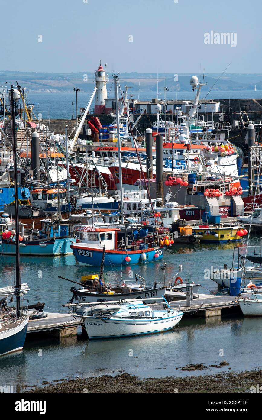 Newlyn, Cornwall, England, UK. 2021. A small fishing boat sailing into