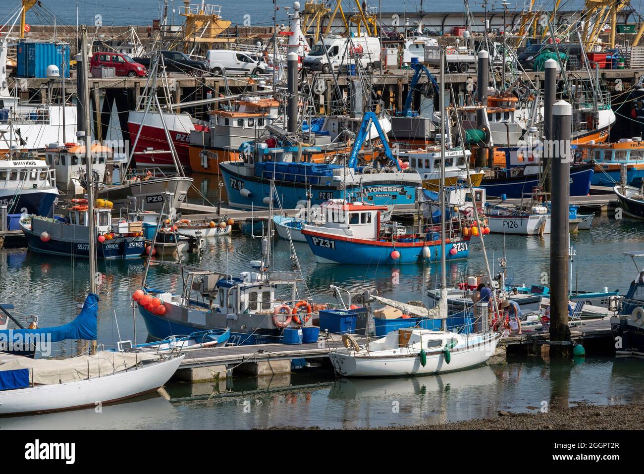 Newlyn, Cornwall, England, UK. 2021. A small fishing boat sailing into