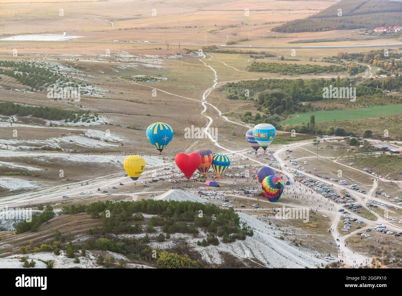 Russia, Crimea, Belogorsk September 19, 2020-Preparation for the launch of colorful balloons at the festival of aeronautics at the foot of the White R Stock Photo