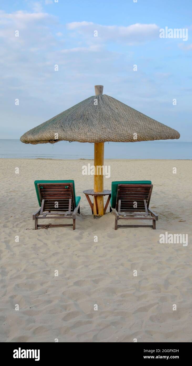 Two Chairs And Parasol Stock Photo Alamy