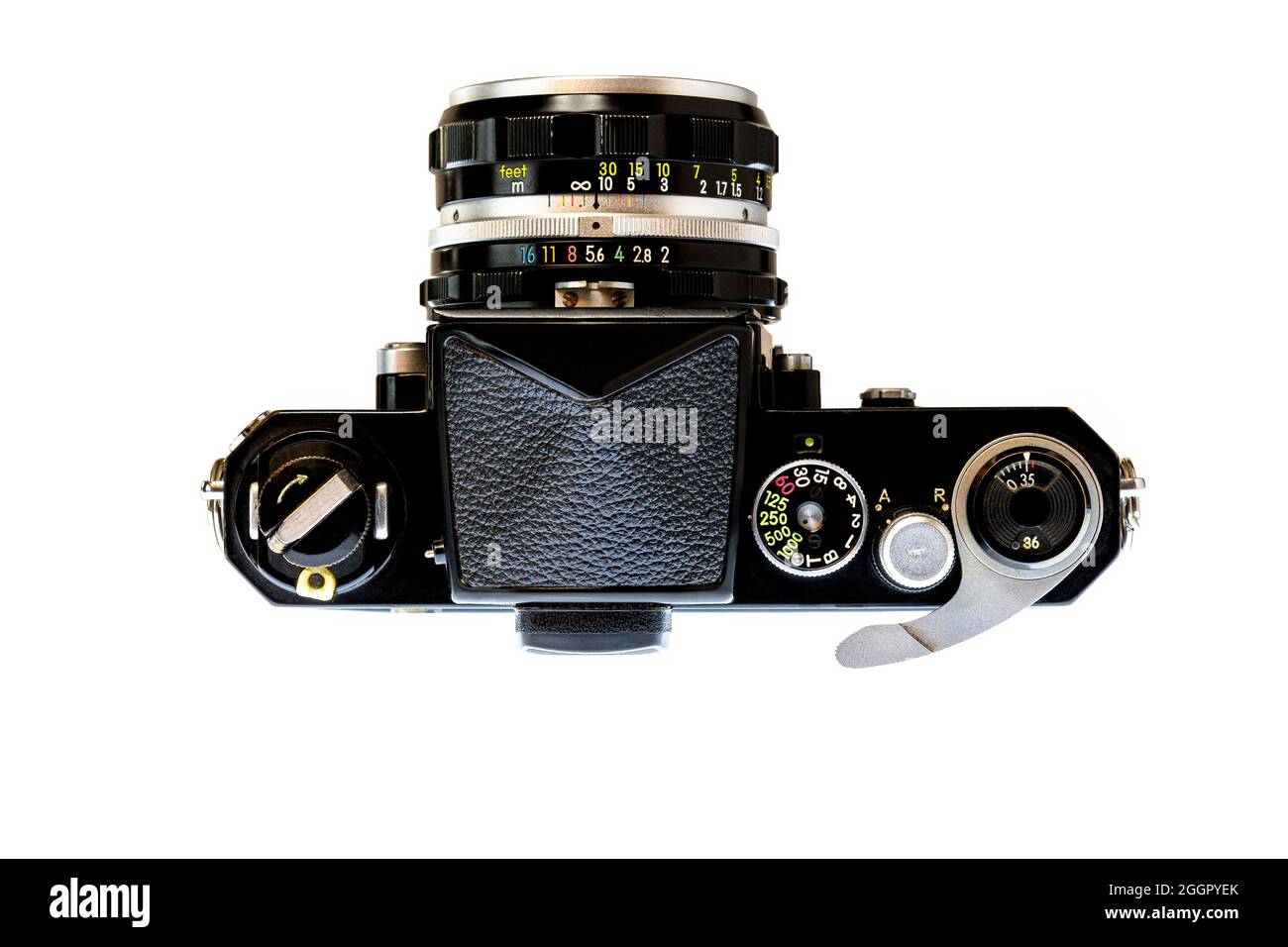 Horizontal shot of a professional 1960’s 35mm SLR camera from above isolated on white. Stock Photo