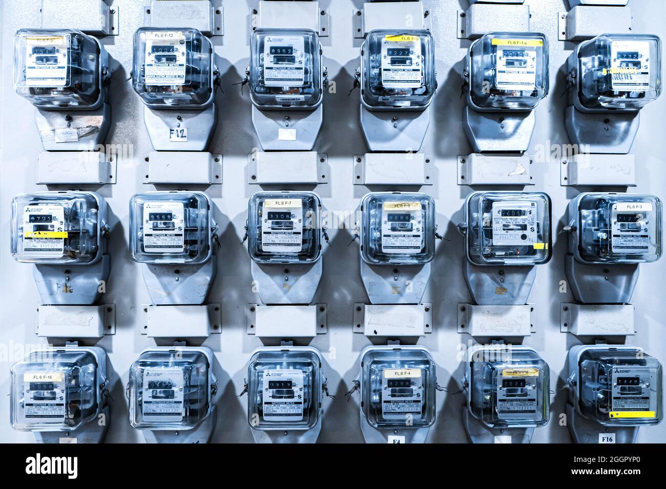 Electricity meters on panel in an apartment building. Samui , Tailand 02.06.2020 Stock Photo