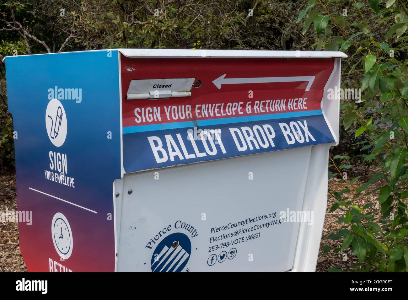 Tacoma, WA USA - circa August 2021: Close up of a Ballot Drop Box outside of a police station in downtown Tacoma. Stock Photo