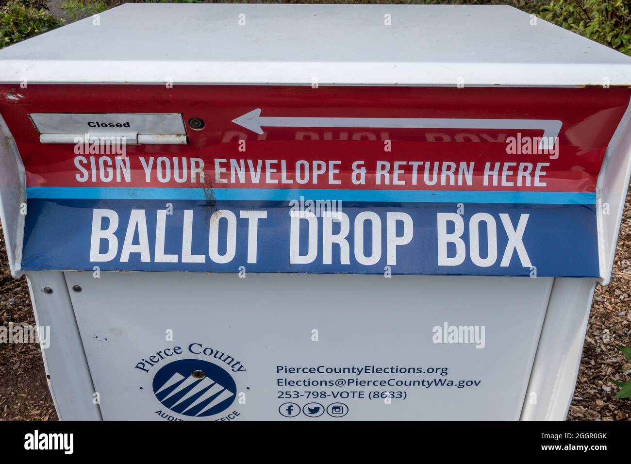 Tacoma, WA USA - circa August 2021: Close up of a Ballot Drop Box outside of a police station in downtown Tacoma. Stock Photo