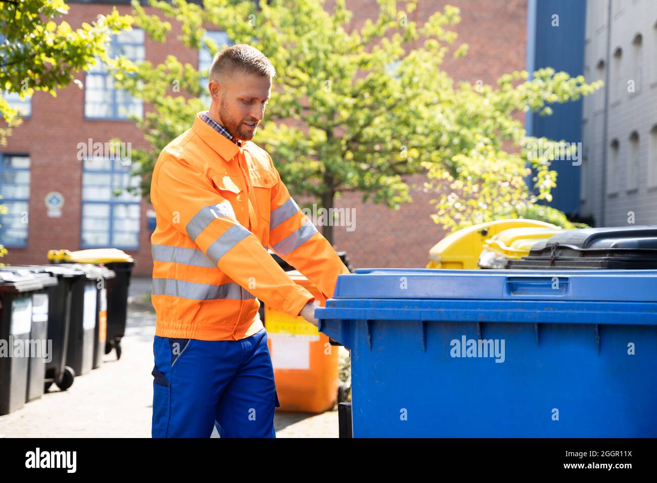 Garbage Removal Man Doing Trash And Rubbish Collection Stock Photo Alamy