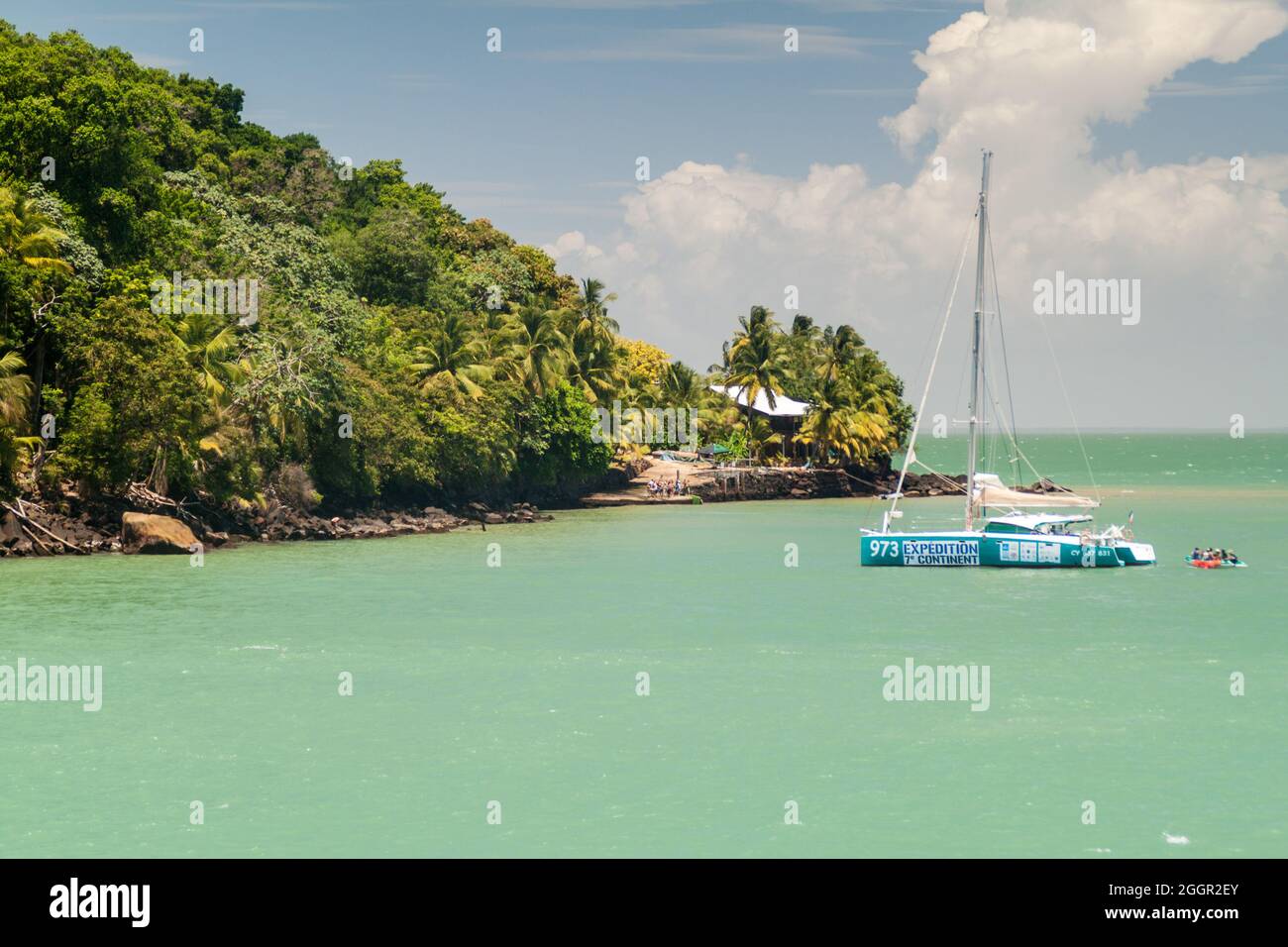 ILE SAINT JOSEPH, FRENCH GUIANA - AUGUST 2, 2015: Catamaran anchored by Ile Saint Joseph, one of the islands of Iles du Salut (Islands of Salvation) i Stock Photo