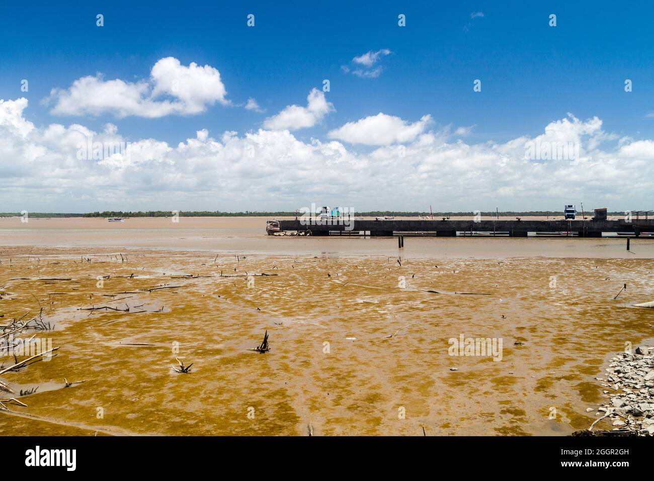 Pier in Cayenne, capital of French Guiana, during the low tide. Stock Photo