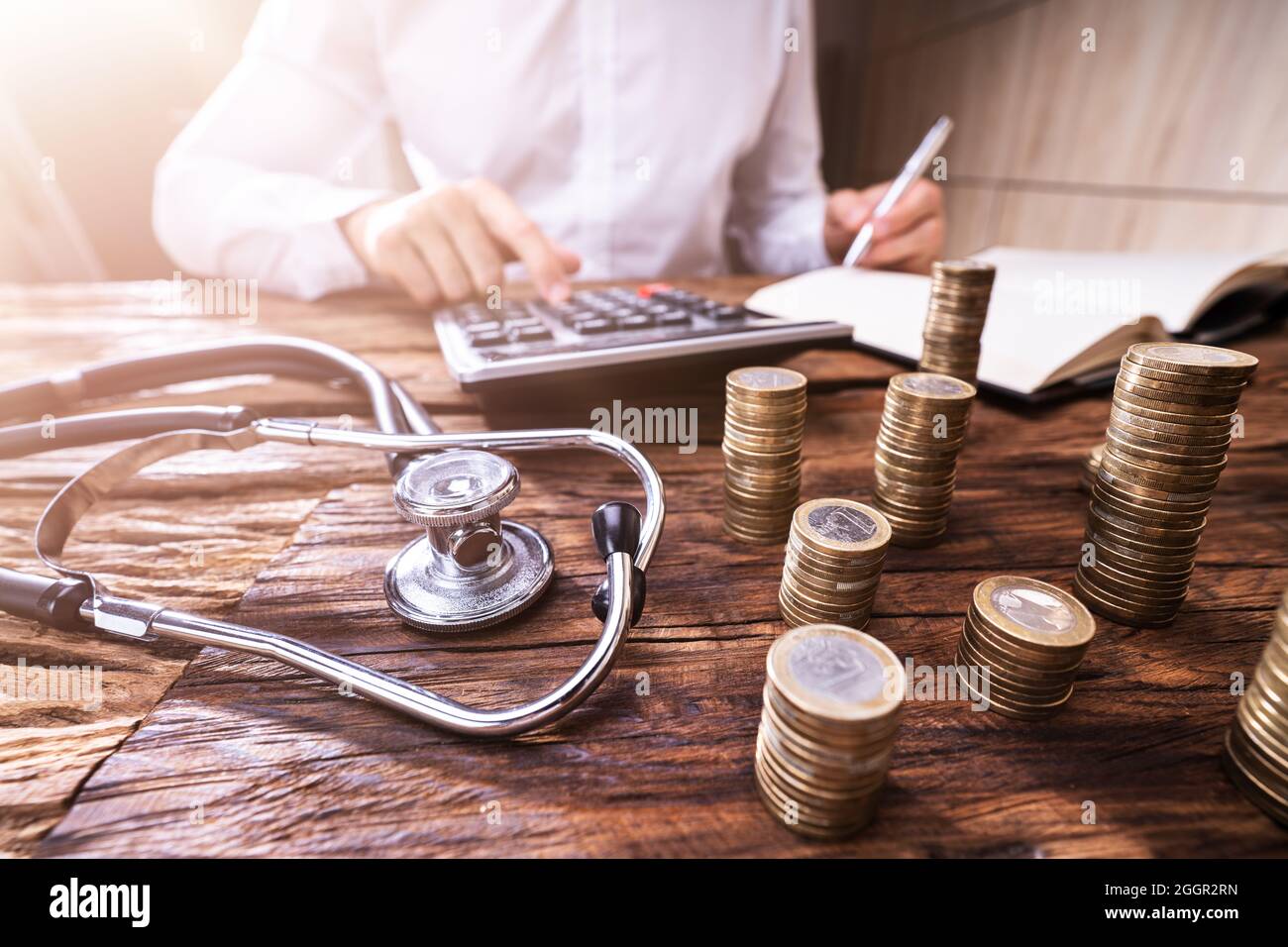 Health And Medical Insurance Cost. Invoice Calculator Stock Photo Alamy