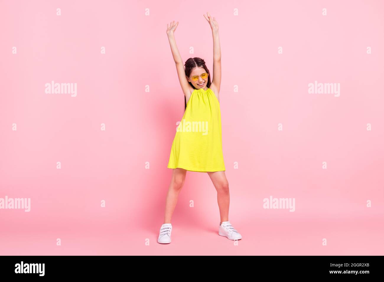 Full length photo of charming cute school girl wear yellow dress ...